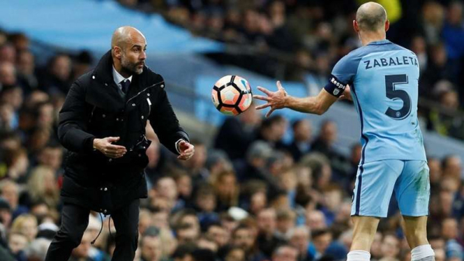 Pep Guardiola (kiri) dan Pablo Zabaleta
