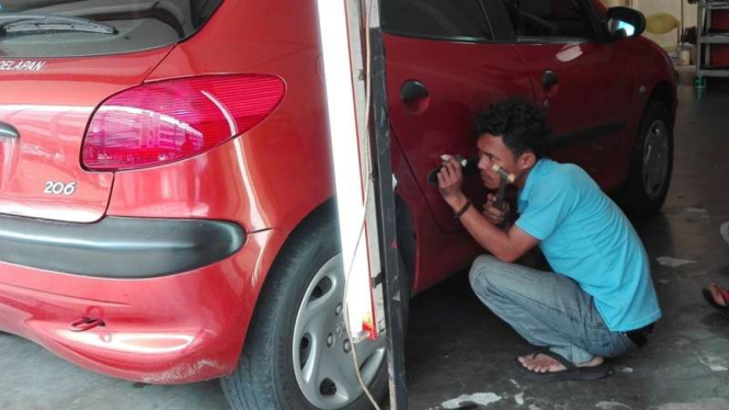 Ketok magic modern di Bengkel PDR.