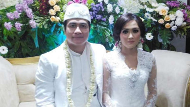 Adjie Pangestu dan Novita di pelaminan, Minggu, 14 Mei 2017.