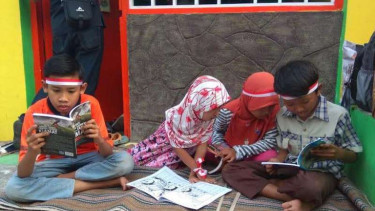 Pos kamling yang disulap jadi perpustakaan