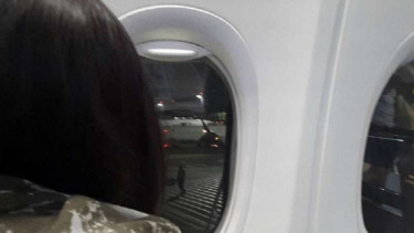 Schapelle Corby di pesawat.