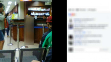 Sosok perempuan tak berbusana yang berbelanja di sebuah apotek di kawasan Mangga Besar Jakarta Barat, Sabtu malam (3/6/2017)