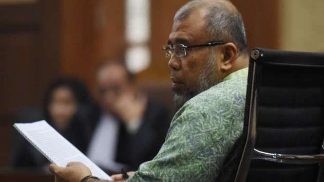 Mantan hakim MK, Patrialis Akbar di persidangan perdana