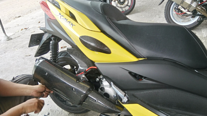 Aksesori bertema karbon untuk Yamaha XMAX.