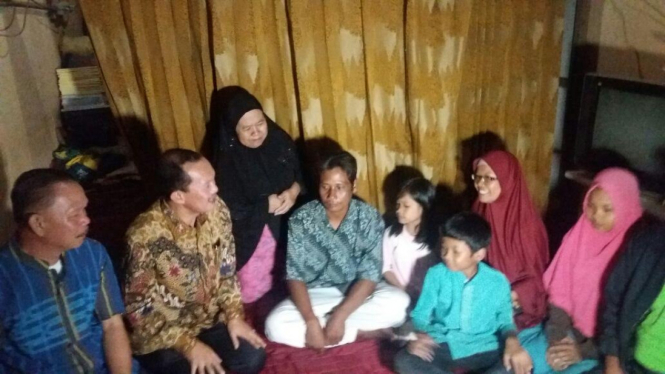 Keluarga Herman (tengah) di Palembang