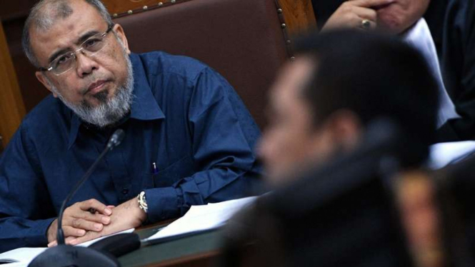 Mantan Hakim MK, Patrialis Akbar dalam sidang suap hakim MK.