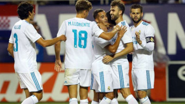 Pemain Real Madrid rayakan gol Borja Mayoral.