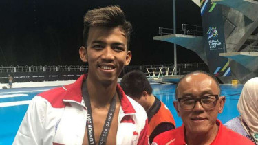 Perenang Indonesia, Triady Fauzi Sidiq, dan Aburizal Bakrie