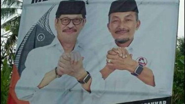 Baliho kampanye milik pasangan Ichsan Yasin Limpo dan Andi Mudzakkar yang mencantumkan logo kampus Universitas Negeri Makassar, Rabu (11/10/2017).