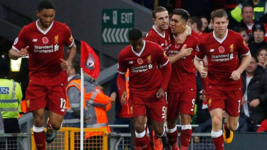 Para pemain Liverpool saat merayakan gol beberapa waktu lalu.