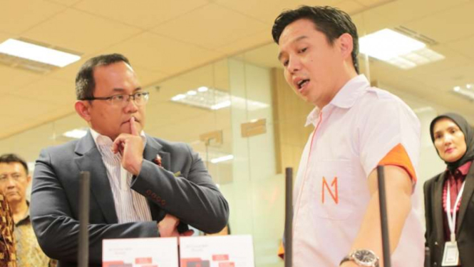 Bupati Musi Banyuasin, Dodi Reza Alex Noerdin dan CEO Net1 Indonesia, Larry Ridwan (kanan).