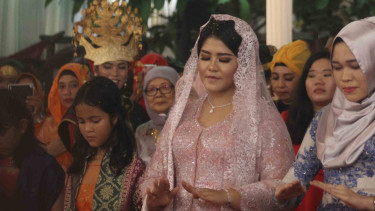 Melihat Prosesi Pemberian Marga Kepada Kahiyang Ayu
