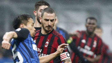 Pertandingan Derby della Madonnina antara AC Milan kontra Inter Milan pada musim lalu.