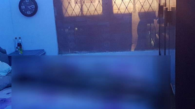 Jenazah Feri saat ditemukan di kamar rumahnya di Depok.