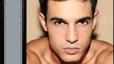 Salah satu tampilan di aplikasi Grindr.