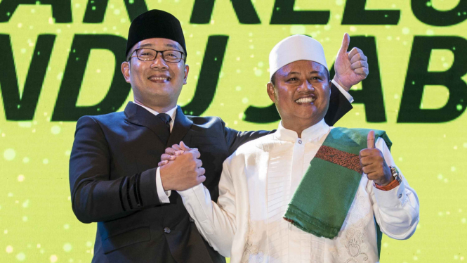 Pasangan Calon Gubernur dan Wakil Gubernur Jawa Barat Ridwan Kamil (kiri) dan Uu Ruzhanul Ulum (kanan).