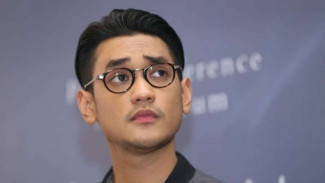 Bikin Penasaran, Afgan Syahreza Unggah Foto dengan Sosok Wanita