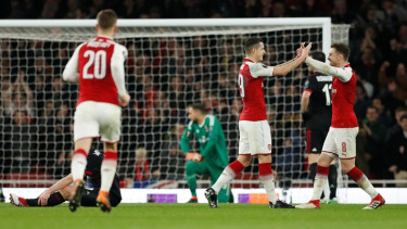 Selebrasi pemain Arsenal.