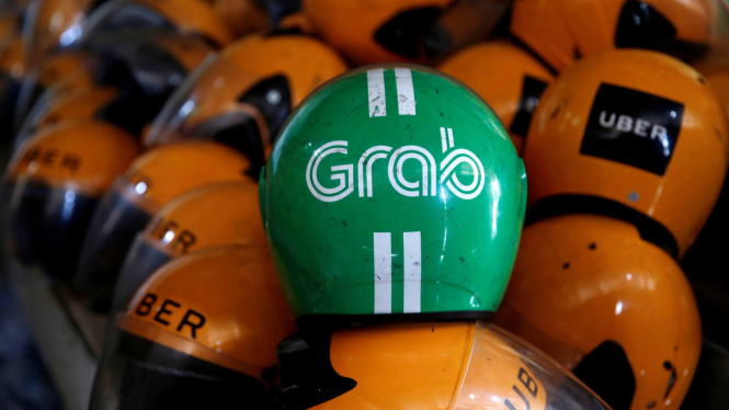 Grab Akuisisi Uber.