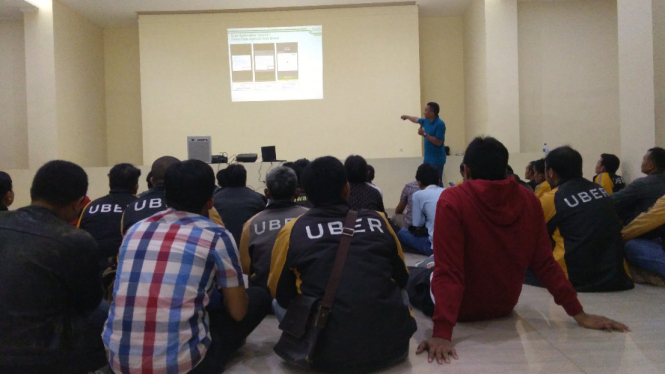 Pengemudi Uber mendaftar Grab