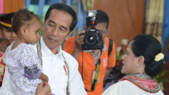 Presiden Joko Widodo dan Ibu Negara Iriana di Papua.