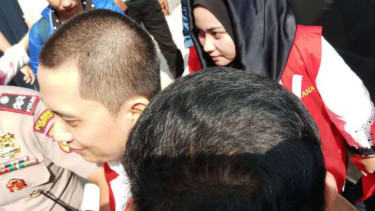 Bos PT First Travel, Andika Surachman dan Anniesa Hasibuan, sesaat sebelum memasuki ruang sidang di Pengadilan Negeri Depok, Jawa Barat, pada Rabu, 30 Mei 2018.