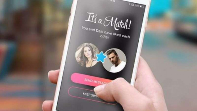 Salah satu aplikasi kencan online, Tinder.