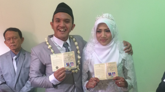 Caisar Aditya Putra dan Intan Sri Mardiani