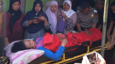 Nining saat berada di rumahnya.