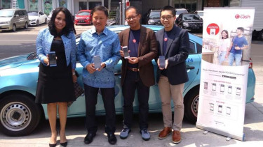 Kerja sama Blue Bird dan TCash.