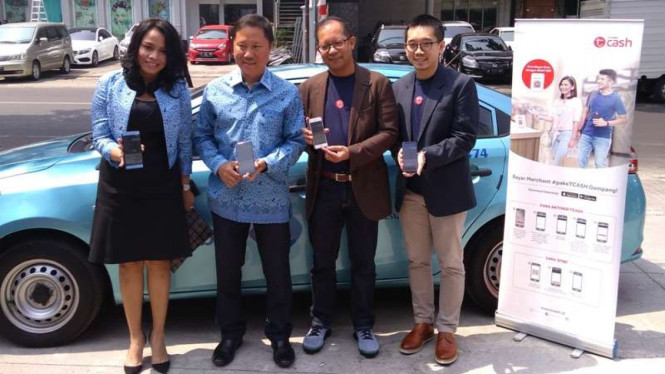 Kerja sama Blue Bird dan TCash.