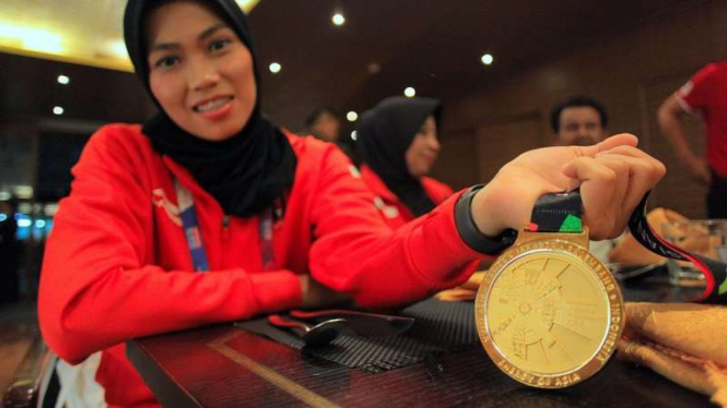 Atlet Taekwondo peraih medali emas Asian Games 2018, Defia Rosmaniar.