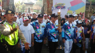 Obor Asian Para Games 2018 diarak keliling Bali.