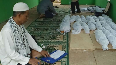 Pemindahan jasad KPU Kumpu Saribah, Depok,  imbas proyek pembangunan Jalan tol.