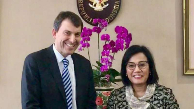 Menteri Muda Inggris Untuk Bidang Ekonomi John Glen.
