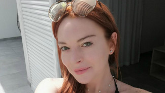 Lindsay Lohan Nantikan Anak Pertama, Pakai Gaun Ketat Pamer Baby Bump