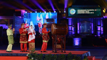 Presiden Joko Widodo saat membuat MTQ ke-27 tahun 2018.