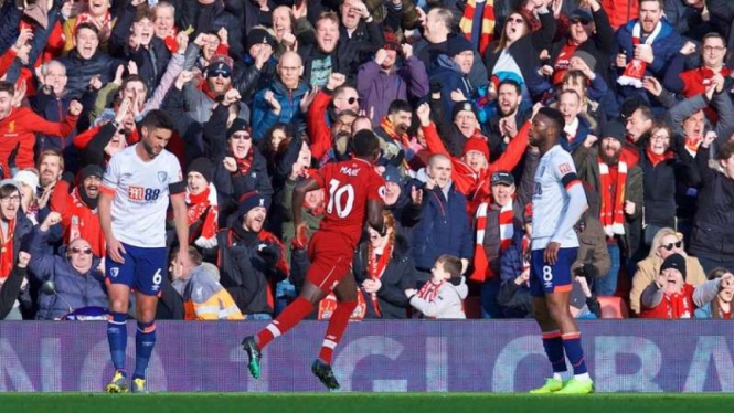 Winger Liverpool, Sadio Mane, melakukan selebrasi usai mencetak gol