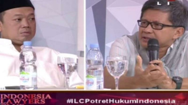 Nusron Wahid (kiri) dan Rocky Gerung di acara ILC