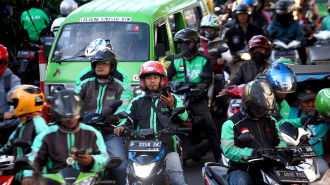 Ilustrasi pengemudi ojek online (ojol).