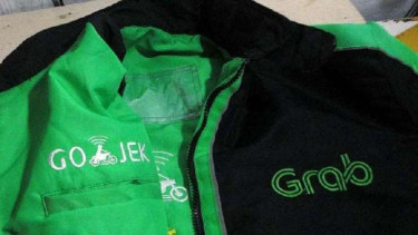 Ilustrasi Gojek dan Grab.