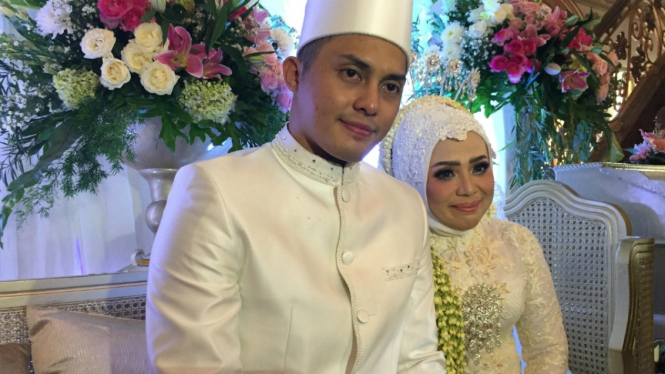 Muzdalifah dan suami baru.