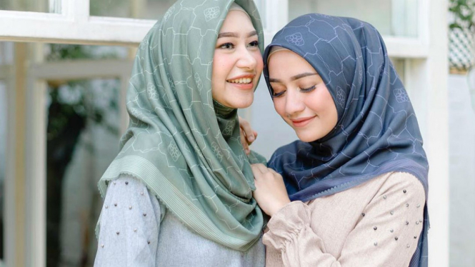 Ilustrasi wanita berhijab.