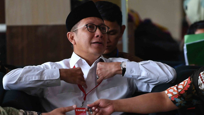 Menteri Agama Lukman Hakim Saifuddin saat menunggu untuk menjalani pemeriksaan di kantor KPK Jakarta, 8 Mei 2019.