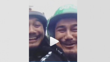 Wajah kembar penumpang dan pengemudi ojek online