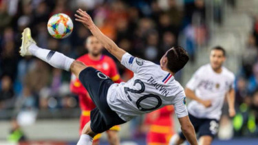 Pemain Prancis, Florian Thauvin saat menghadapi Andorra.
