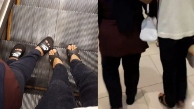 Pria bertukar sandal dengan ibunya