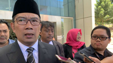 Gubernur Jawa Barat Ridwan Kamil usai berbicara dalam forum The 2019 Padjadjaran Communication Conference Series di kampus Universitas Padjadjaran, Bandung, Selasa, 6 Agustus 2019.