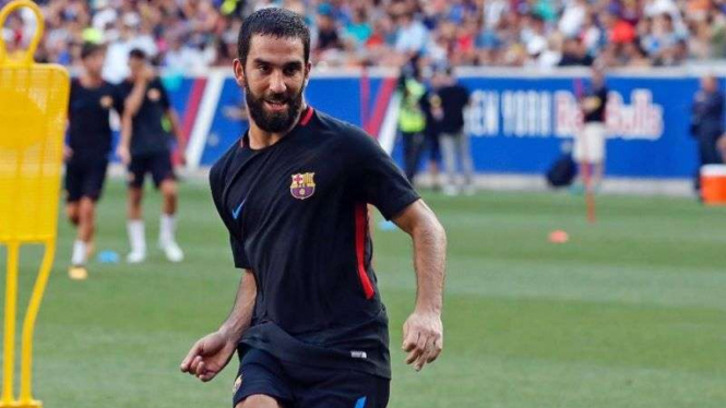 Arda Turan saat masih membela Barcelona