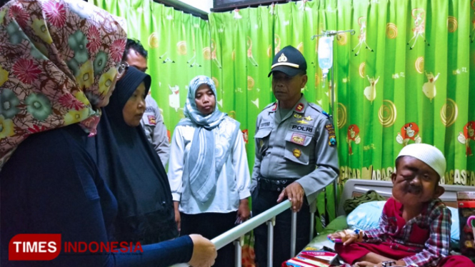 Mohammad Riqi, bocah yatim piatu 9 tahun penderita tumor ganas di wajahnya. (FOTO: Agung Sedana/ TIMES Indonesia)